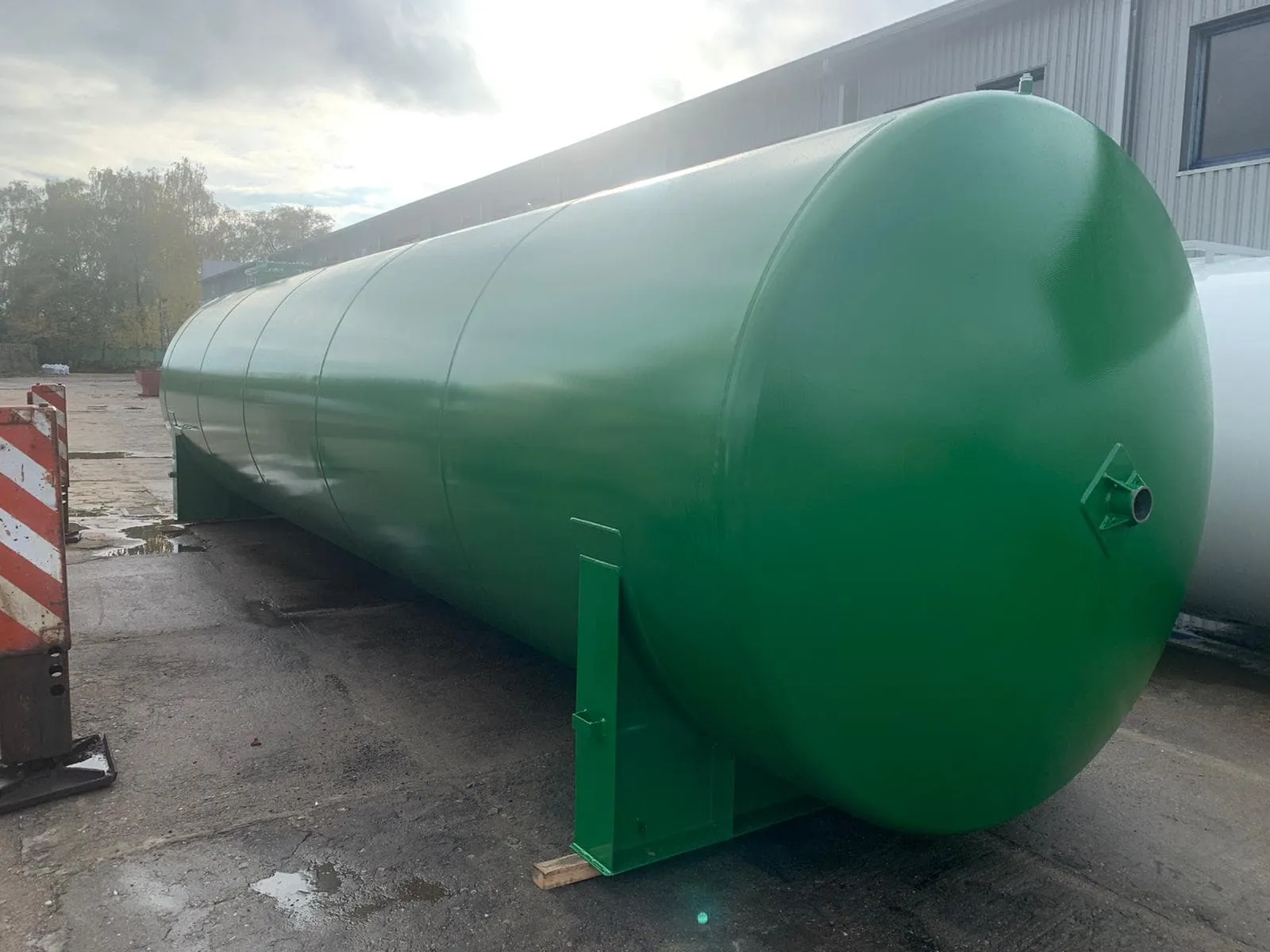 WHG-compliant steel storage tank for water-hazardous substances at an industrial site